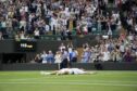 The best moment in Cameron Norrie's run to the quarter-finals was his fall to the ground after clinching match point against Nicolas Jarry. Image: PA