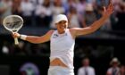 Iga Swiatek celebrates victory over Amanda Anisimova following the Ladies' Singles Final on day thirteen of the 2025 Wimbledon Championships at the All England Lawn Tennis and Croquet Club, London. Picture date: Saturday July 12, 2025.
