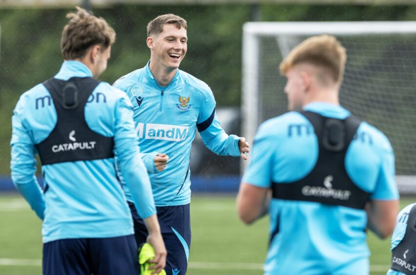 Matty Foulds joins his new team-mates in training.