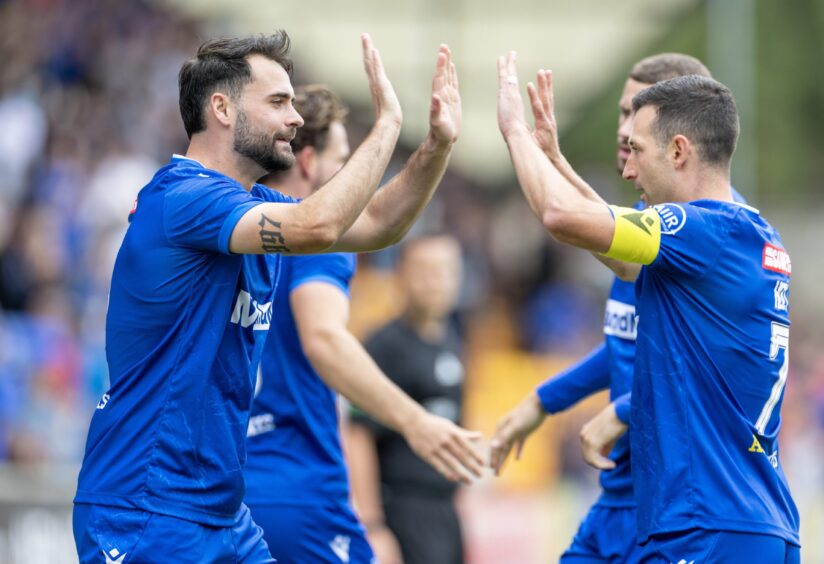 Rhegan Tumilty celebrates his goal. 