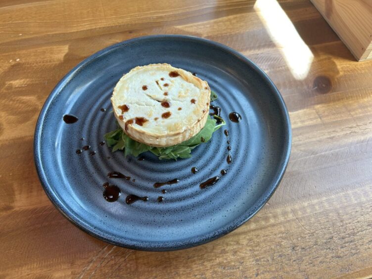 The goat's cheese and onion tart served at Room With A View Restaurant.
