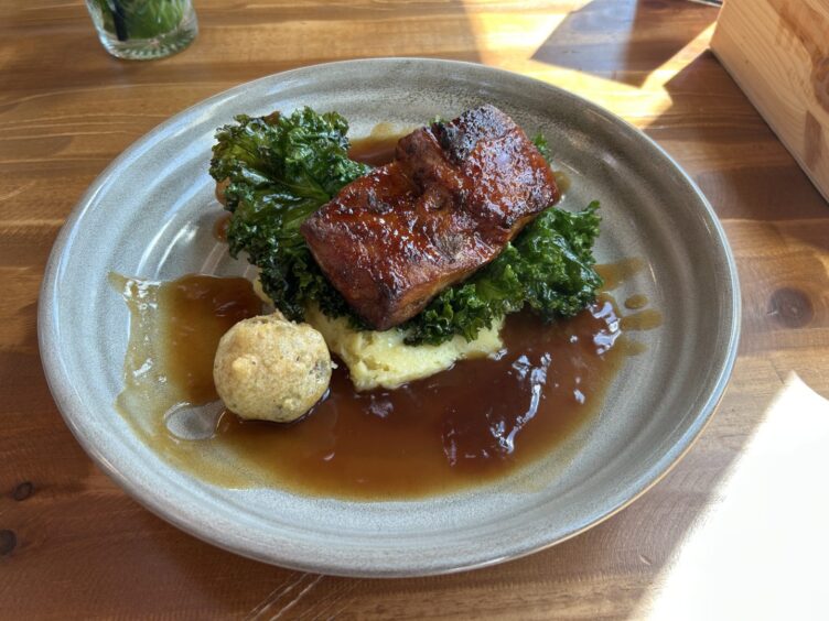 The glazed belly pork served at Room With A View Restaurant.