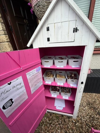 Taylor's cake shed with the door open.