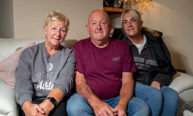 CR0053965, Cheryl Peebles, Dundee. Picture of Helen Macfarlane whose son Marc committed suicide 5 years ago, for article about new suicide support group. Picture Shows: From L-R Marc's parents and sister, Helen Macfarlane, Colin Macfarlane, and Jennifer Macfarlane posing for pictures at home, Newtyle, Perth. Wednesday 02nd July 2025. Image - Richard Hancox/DC Thomson