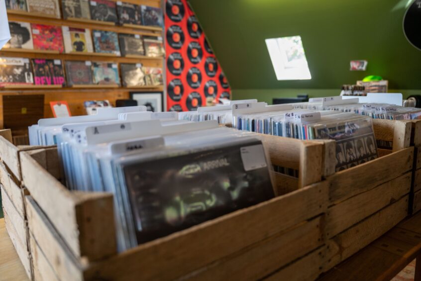 Crates of records on table in Foot of the Mountain Records