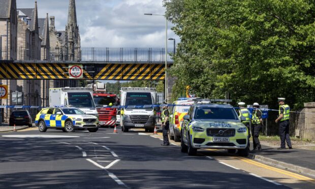 Emergency services arrive on Tay Street