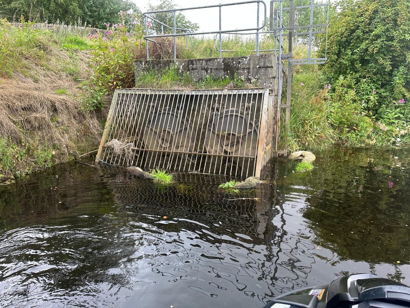 Sunken oil booms at the North Muirton storm drain.