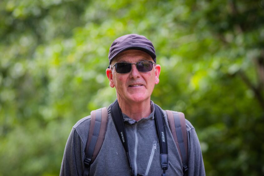 Alastair Forsyth wearing dark cap and sunglasses
