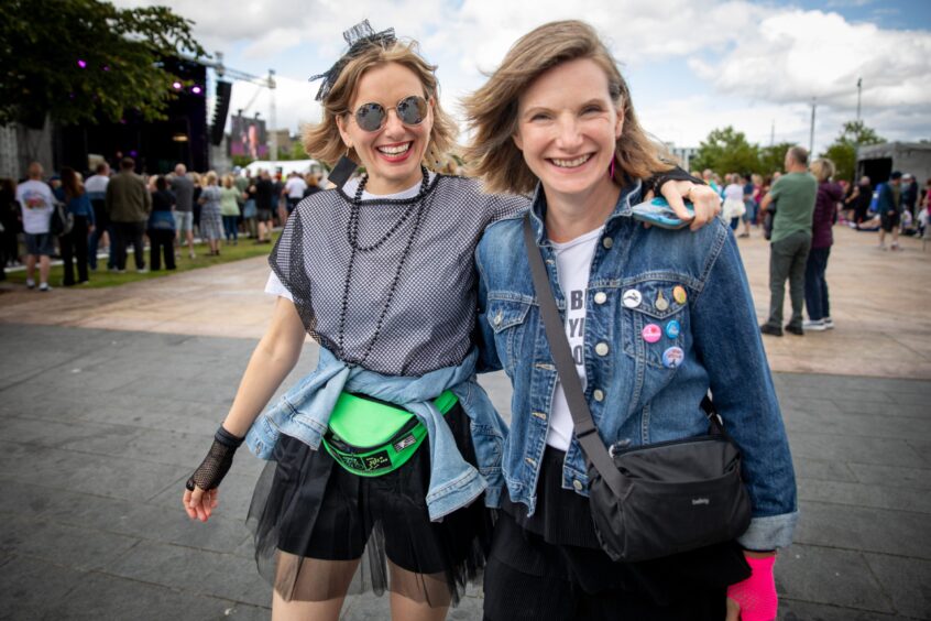 A pair of fans smile for the camera at Dundee's Discovery Festival.
