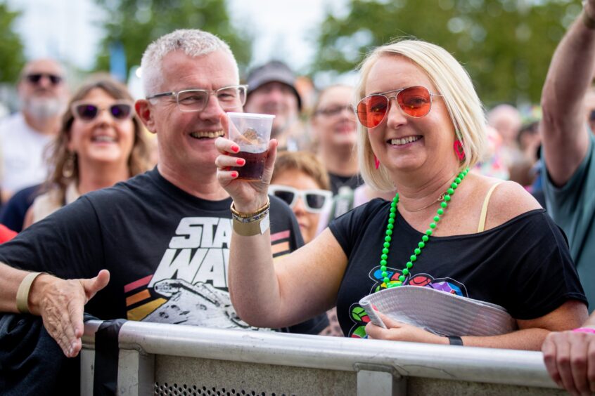 Fans enjoying a drink at the Discovery Festival.