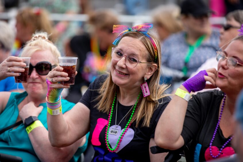 Revellers at the Dundee Discovery Festival raise a toast to the bands.