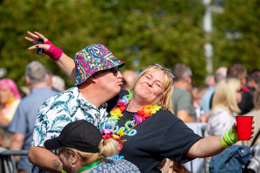 A couple enjoying a kiss at the Dundee Discovery Festival.