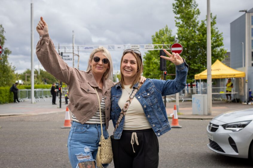 A couple of women looking forward to seeing Ocean Colour Scene perform at the Discovery Festival.