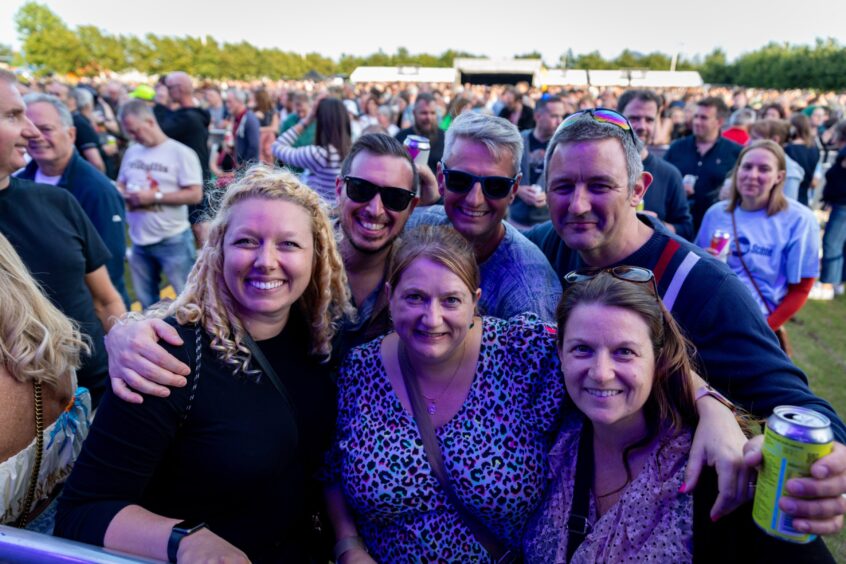 A happy group of people at the Discovery Music Festival.