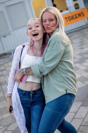 Happy visitors to Discovery Music Festival.