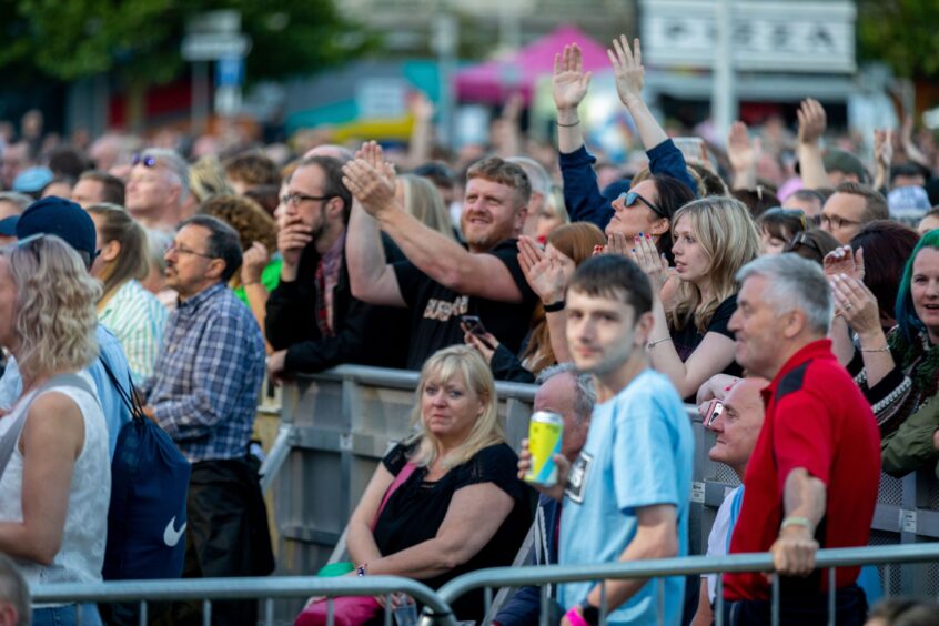 A happy crowd enjoy the Discovery Festival in Dundee.
