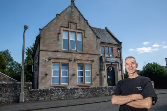 Owner Louis Dowley outside Over The Bridge in Bridge of Allan. Image: Steve Brown/DC Thomson