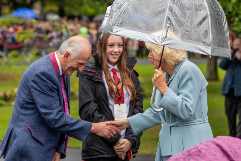 The Queen meets stonemason George Sweeney