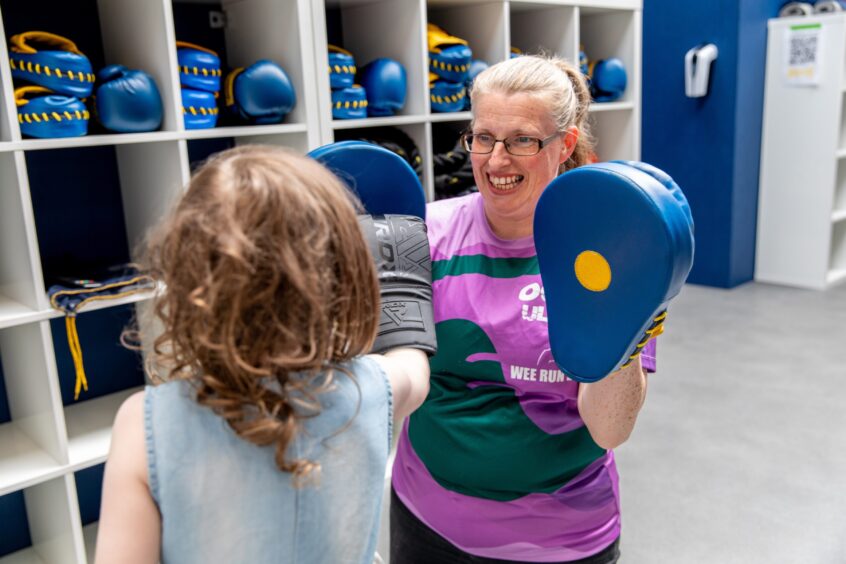 Nic with daughter Olly (5) practicing Boxercise at Perth Fitness Studios