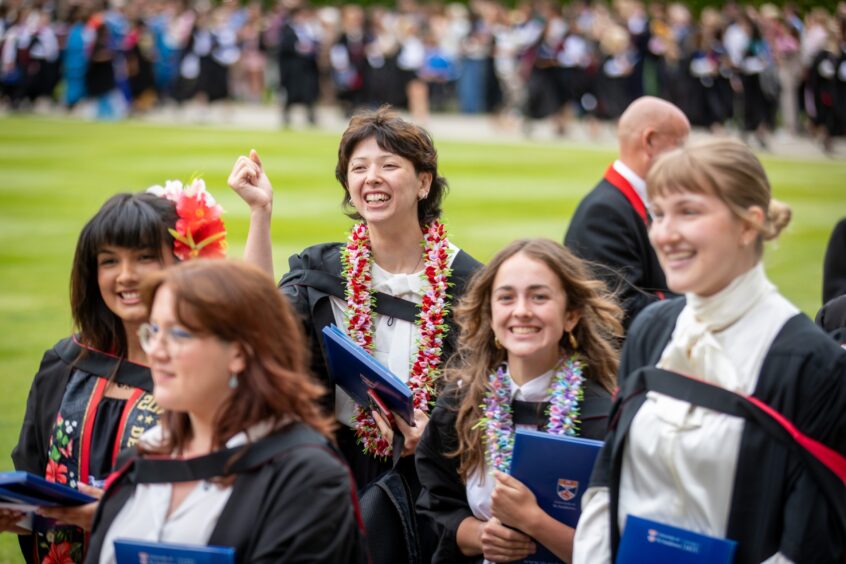 Graduates make their way to St Salvator's Quad after the ceremony at St Andrews University graduation.