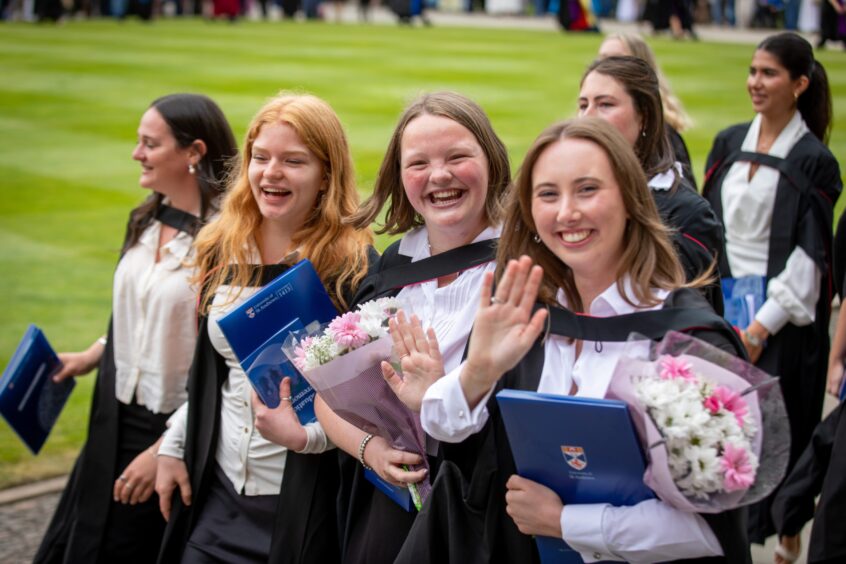 Graduates make their way to St Salvator's Quad after the ceremony at St Andrews University graduation.