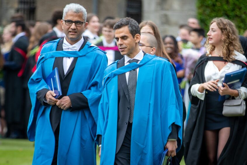 Graduates make their way to St Salvator's Quad after the ceremony at St Andrews University graduation.