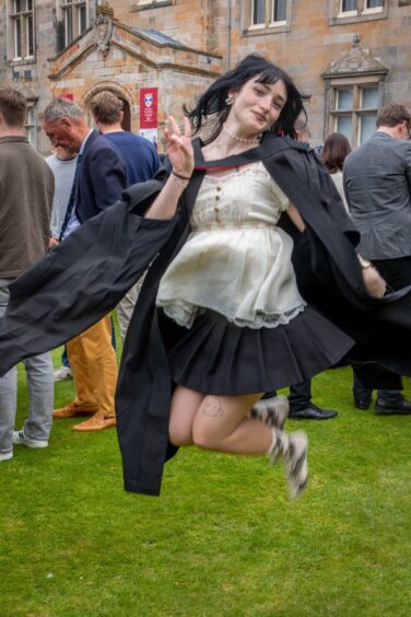 Jumping for joy is Ella Pastorius from the US.
