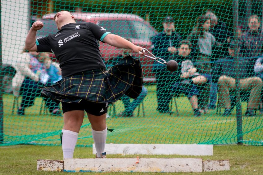 An entrant in the men's heavyweight division during the weight throw event at St Andrews Highland Games.