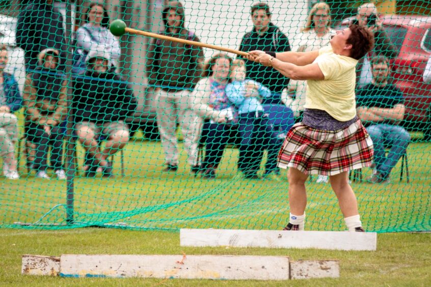 An entrant in the ladies division during the hammer throw at the St Andrews Highland Games.
