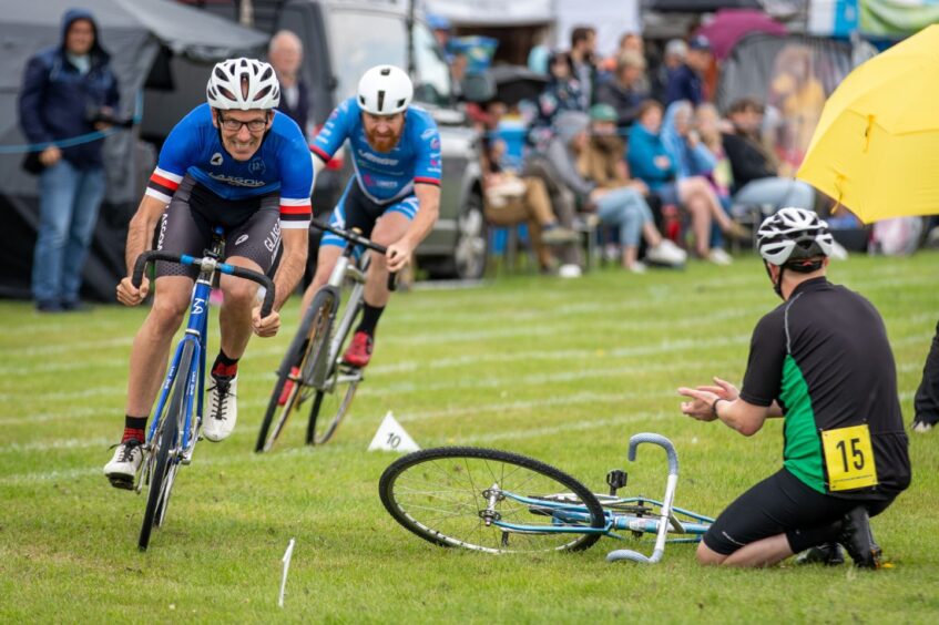 Cyclists on the track during St Andrews Highland Games.