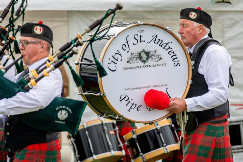 Members of the City of St Andrews Pipe Band performing at St Andrews Highland Games.