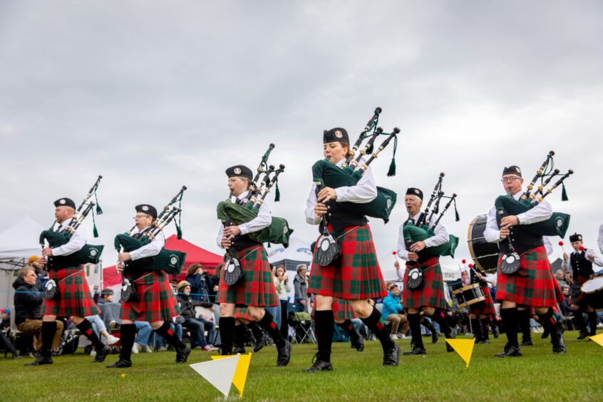City of St Andrews Pipe Band welcome the crowds to St Andrews Highland Games at Station Park.