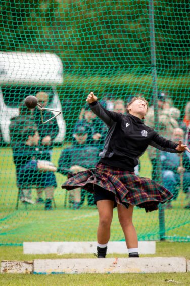 One of the entrants in the ladies heavyweights division during the weight throw at the St Andrews Highland Games.