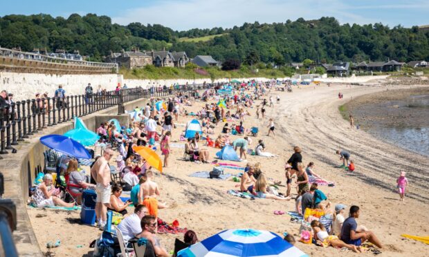 Hundreds of people flock to Burntisland Beach over the weekend.