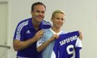 Mark Robertson, left, and a schoolboy Zac Sapsford