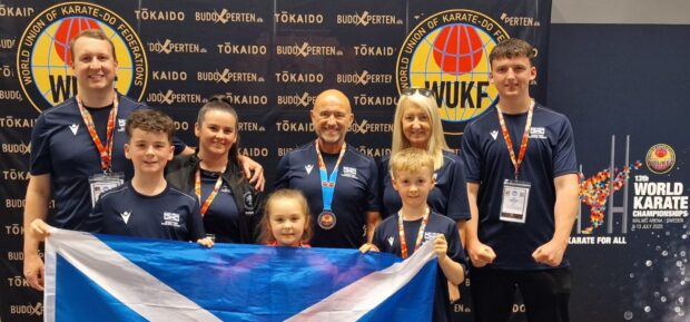 The Young family and Leo Johnston from Lonforgan (right) were representing Scotland at the WUKF World Championships. Image: Supplied