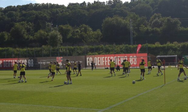 Dundee United players are put through their paces.