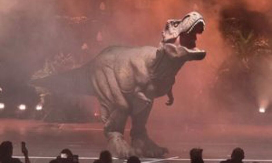 Jurassic Earth show Dinosaur animatronic dinosaur T Rex roaring.