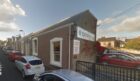 7 Bank Street, Blargowie, a one-storey office building on narrow street
