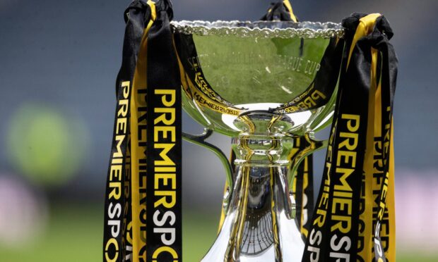A close-up of the Premier Sports Cup trophy.