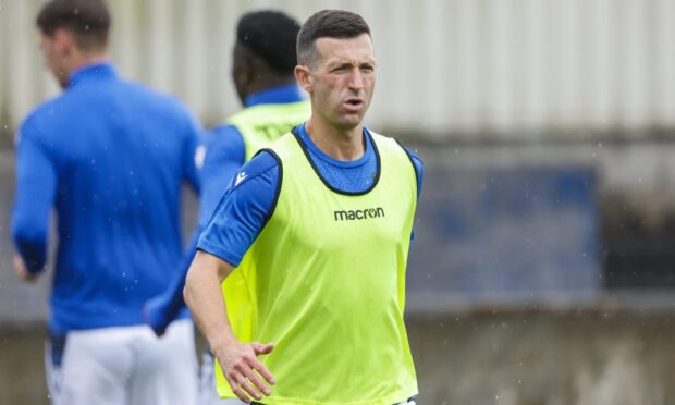 Jason Holt in a St Johnstone warm-up.