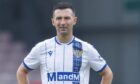 Jason Holt with his hands on his hips during a game against Inverness.