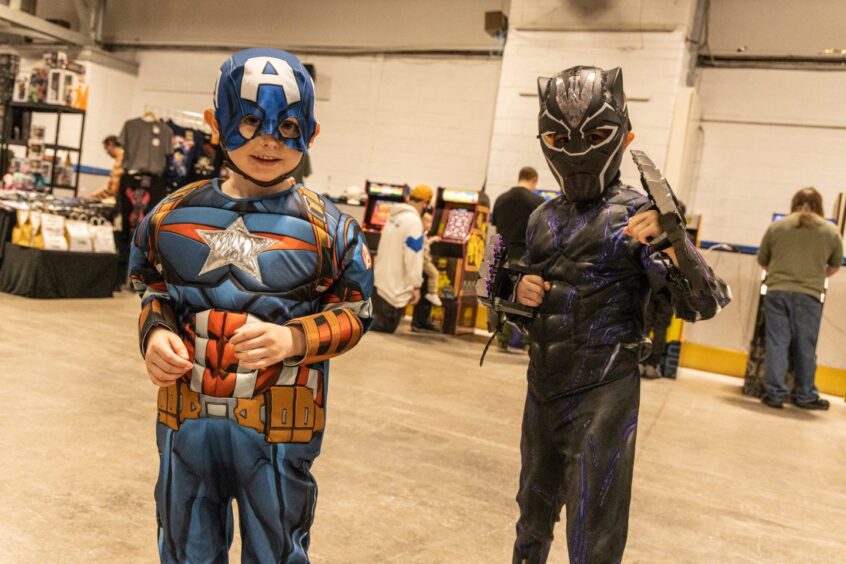Youngsters dressed up as Captain America and Black Panther at Perth Comic Con 2025.