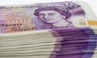 Pile of £20 notes