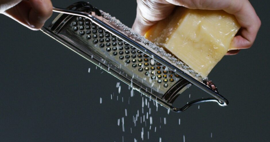 Cheese being grated