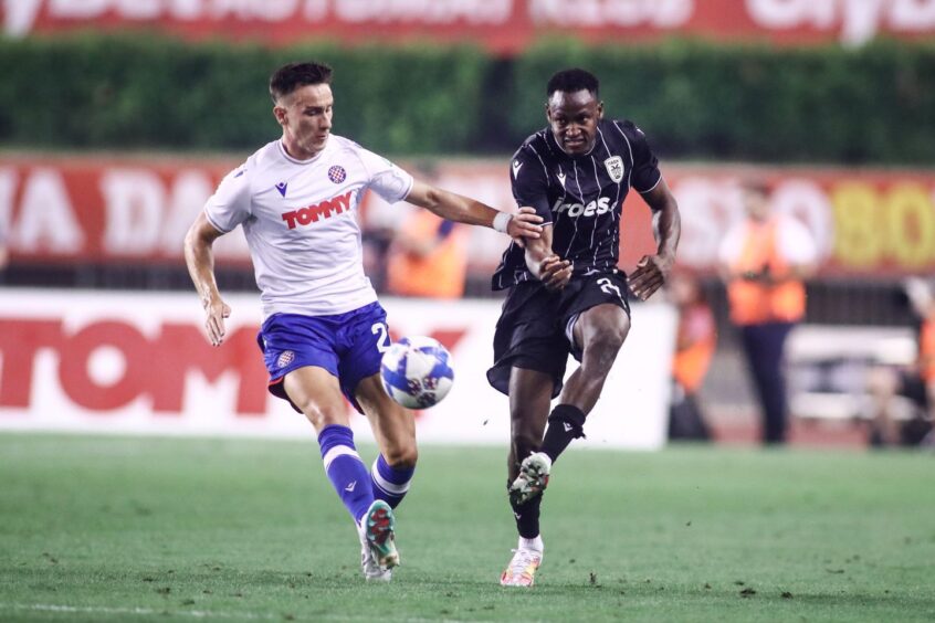 Ivan Dolcek, left, in continental action against PAOK.