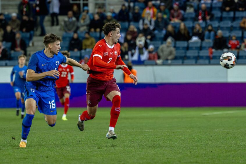 Dario Naamo, No.16, in action for Finland U/21s against Switzerland
