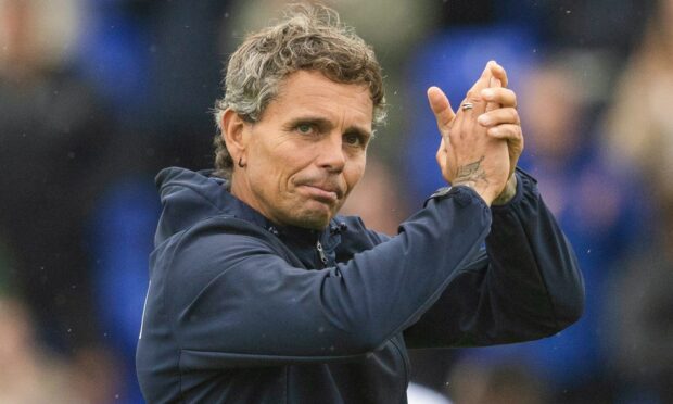 Simo Valakari applauds the St Johnstone fans after a victory in Inverness.