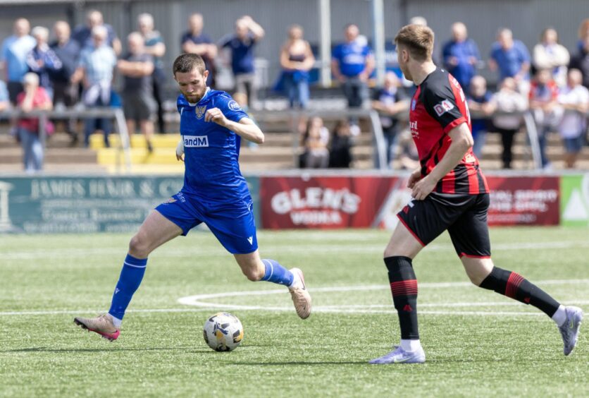 Sam Stanton tries to get the ball under control.