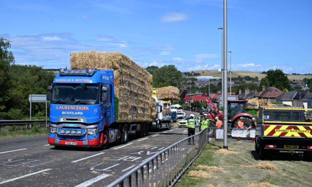 Lorry with straw bales.